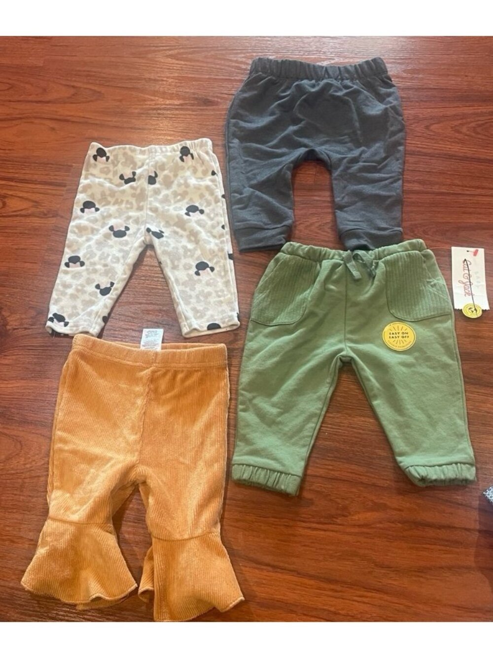 CAT AND JACK DISNEY LOT OF 4 PANTS 3M